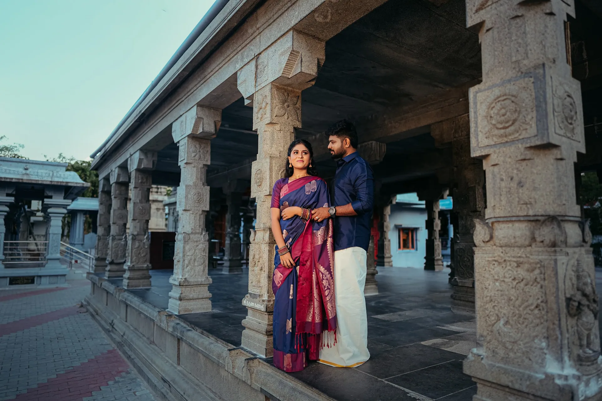 Suriyaa and Sadhana among the stone pillars at Arupadai Veedu Murugan Temple, Besant Nagar.