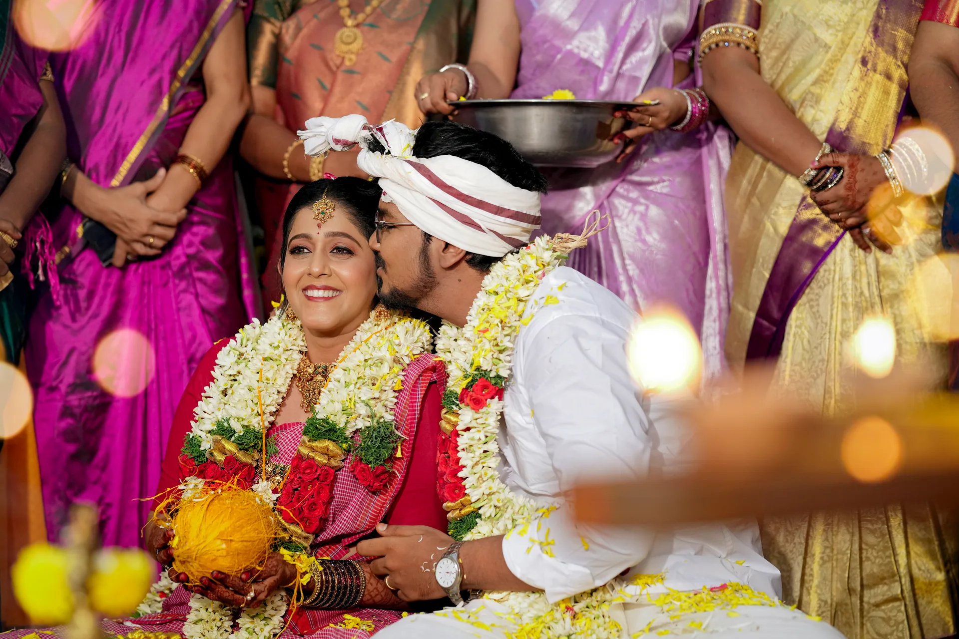 Swathi and Dinesh sharing a joyful moment during their wedding ceremony in Chennai.